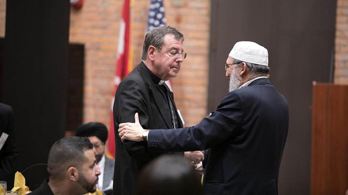 Detroit Archbishop Allen H. Vigneron and Imam Steve Elturk exchanging thoughts at an Interfaith Religious Freedom Conference held in Detroit, Michigan, Tuesday, November 7, 2017. ©2017 by Intellectual Reserve, Inc. All rights reserved